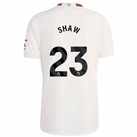 Kandiny Bambino Maglia Luke Shaw #23 Bianco Kit Gara Third 2023/24 Maglietta